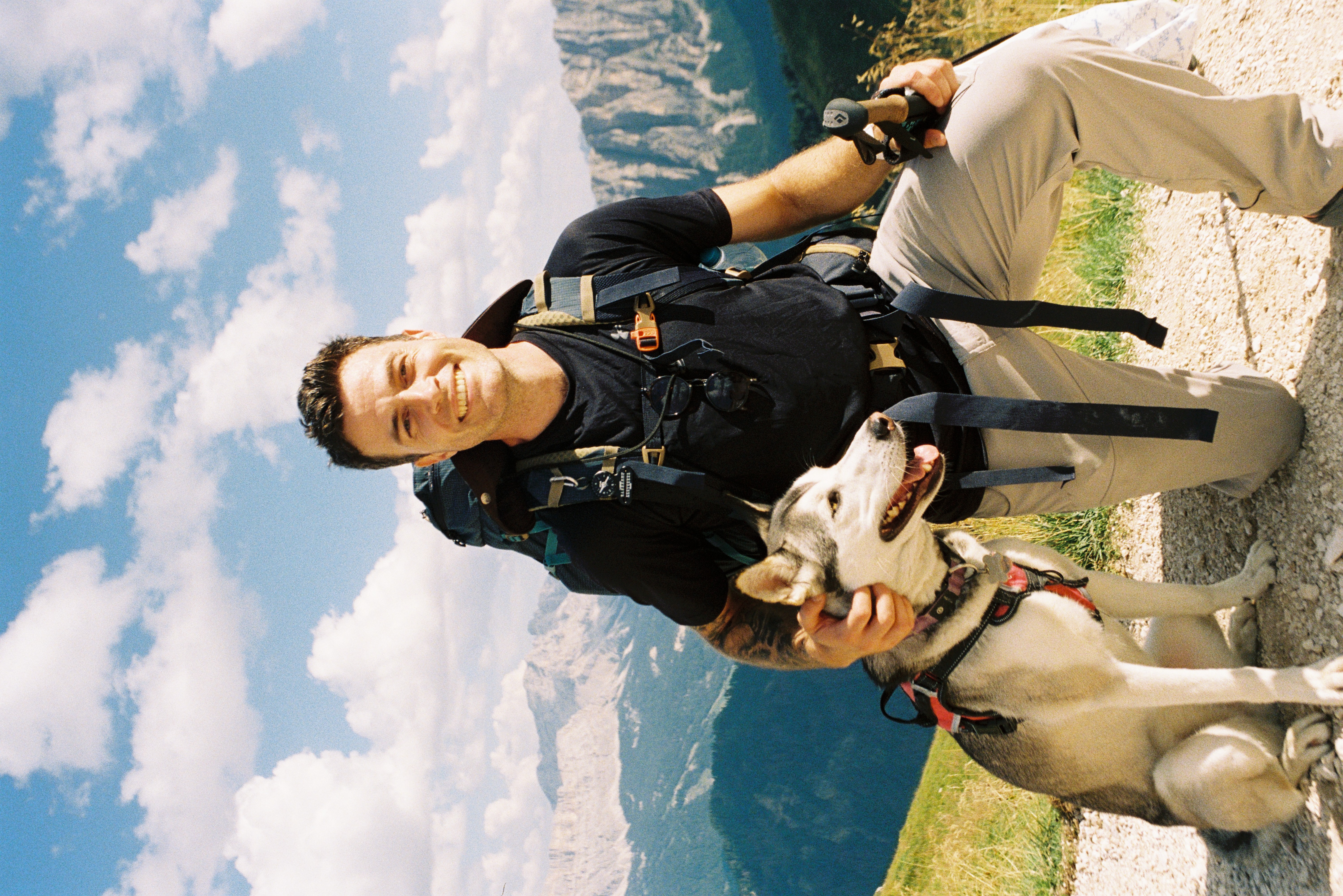 Noah and his service dog in the mountains